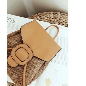 Woven tan backpack